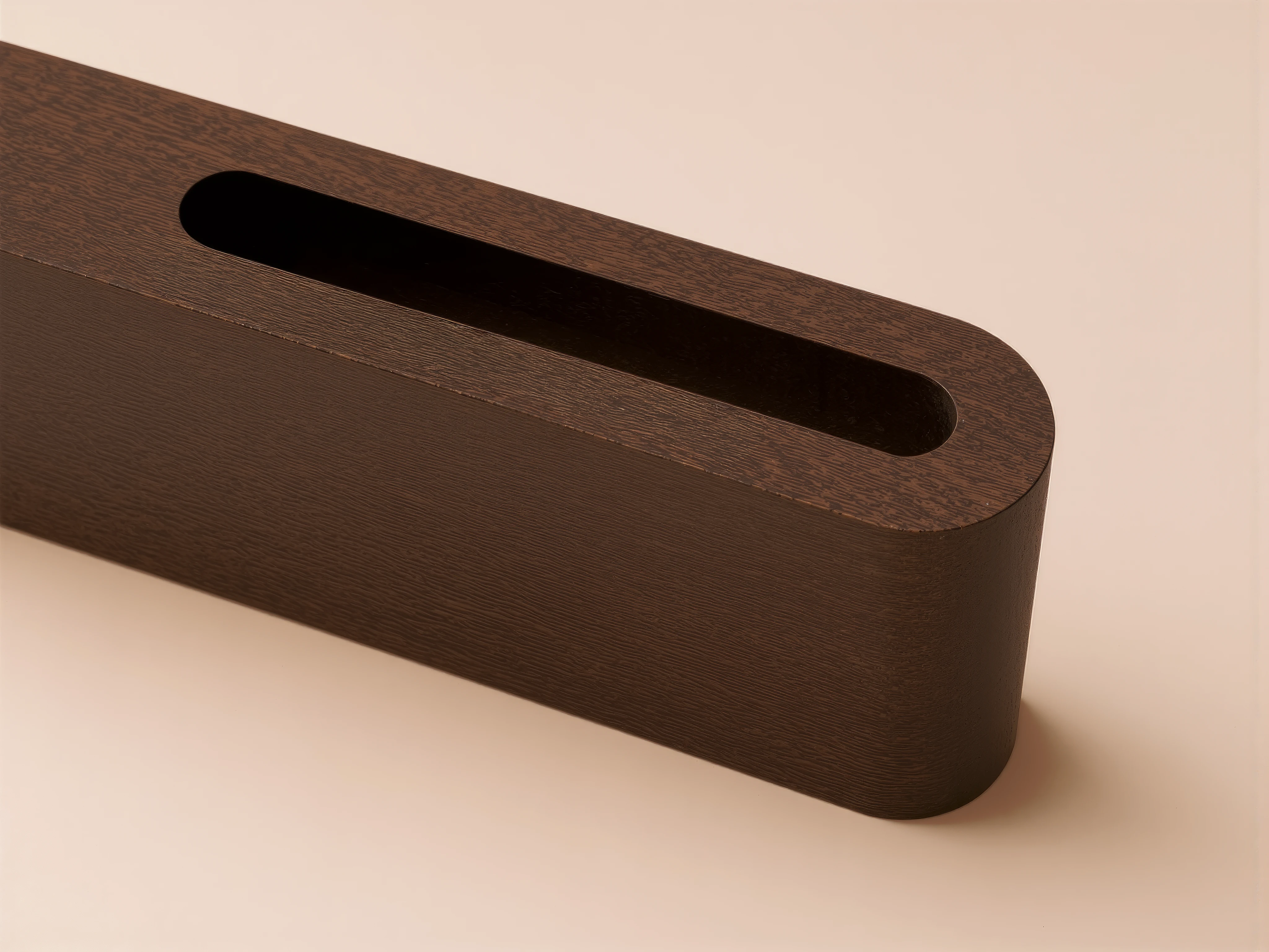 Close-up of a dark walnut MUUJEE desk organizer, showing the rounded corner and card slot.