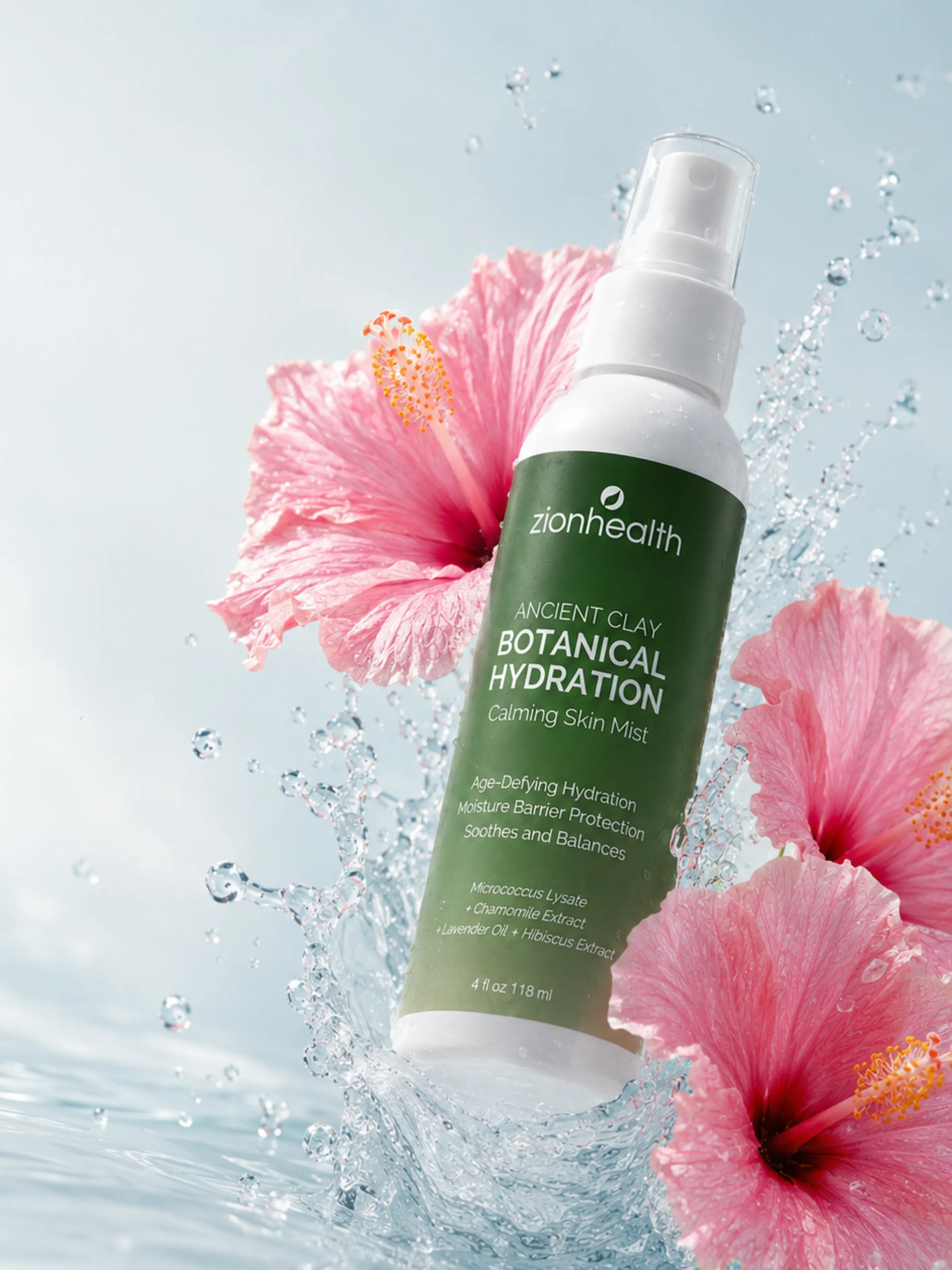 A hand holding Zion Health Ancient Clay Botanical Hydration Calming Skin Mist in a cozy, plant-filled room.